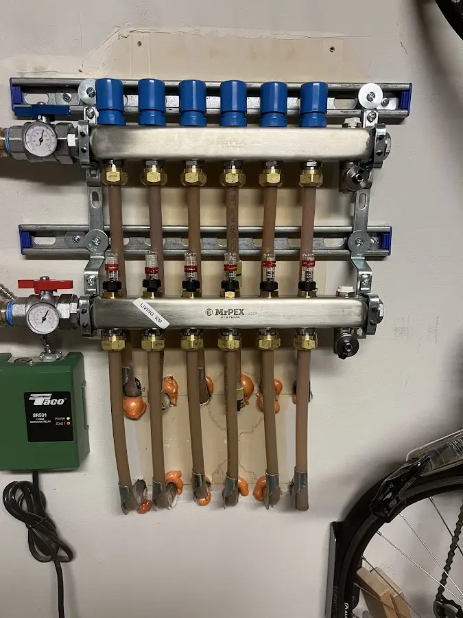 Plumber performing Water Heater Repair at a residential property in West Amwell